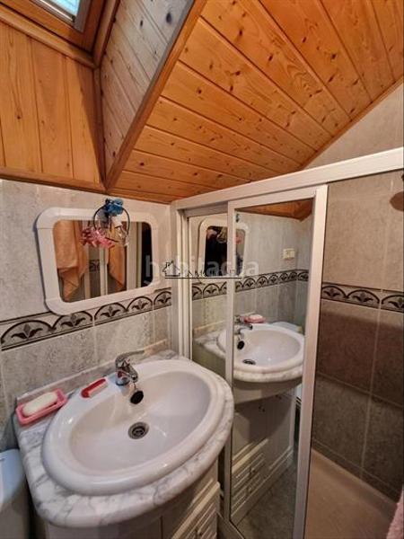 Foto ddf0cec1-e2a0-4d65-b26d-98db5ffc11e9. Casa adossada a Forcarei