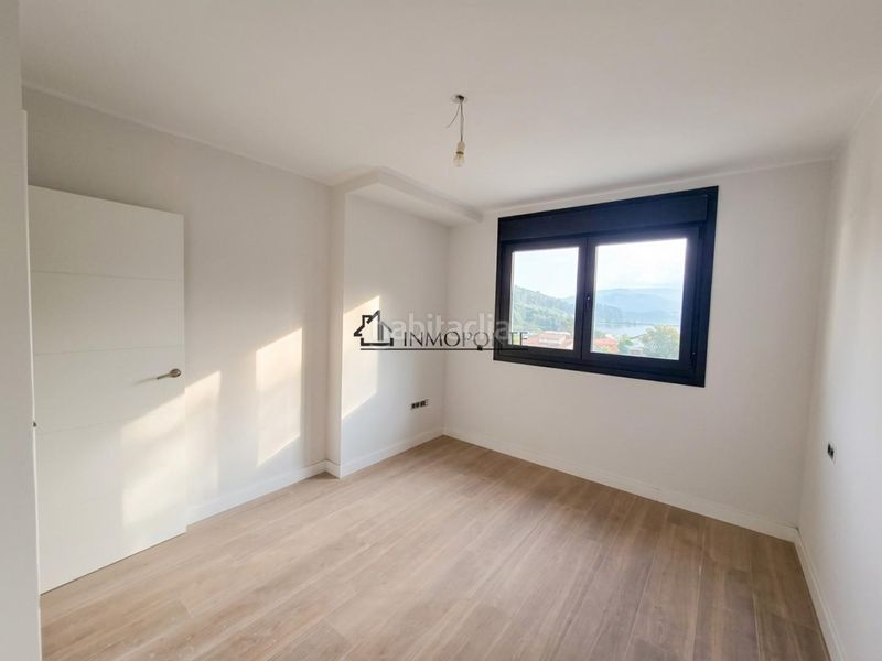 Foto b5d21134-78f1-4fee-95a1-56c740539bb6. Casa aparellada amb calefacció aparcament a Vilaboa