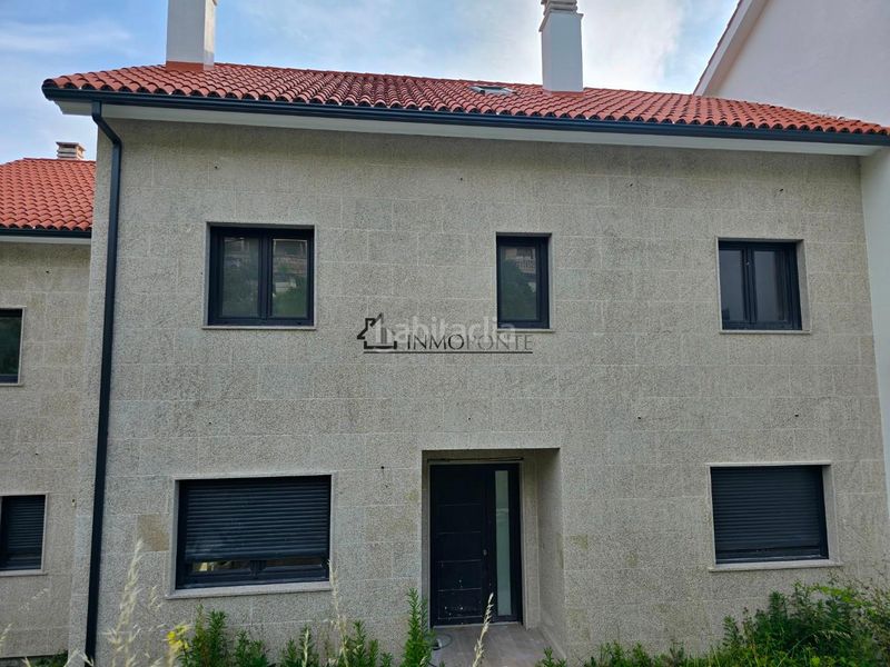 Foto bc3c508a-6cad-494f-aec6-297026102724. Casa aparellada amb calefacció aparcament a Vilaboa