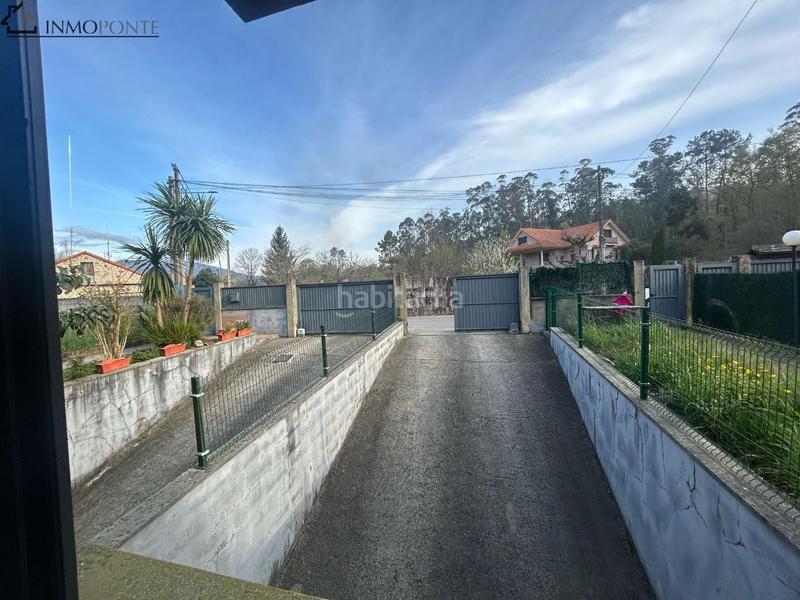 Foto a12fd5b3-2908-410a-baa1-26e1f4ebceb8. Casa pareada en venta chalet pareado en bugarín, fantástico chalet pareado situado en una tranquila zona residencial de bugarín, a en Ponteareas