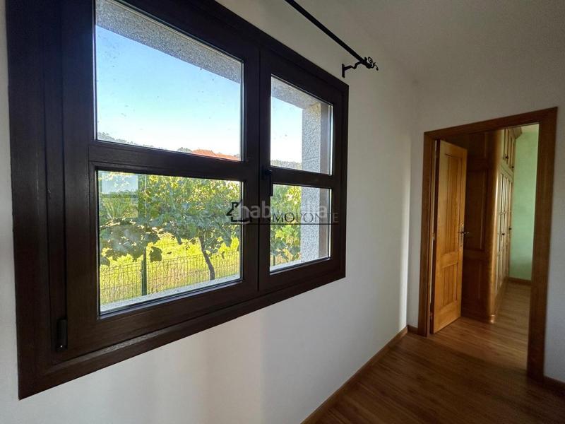 Foto 43808abf-38d8-4273-be2f-12e3dee4744a. Casa chalet de piedra con viñedo, árboles frutales y vistas al mar sanxenxo en la exclusiva zona de casal, a tan solo tres minutos en en Meaño