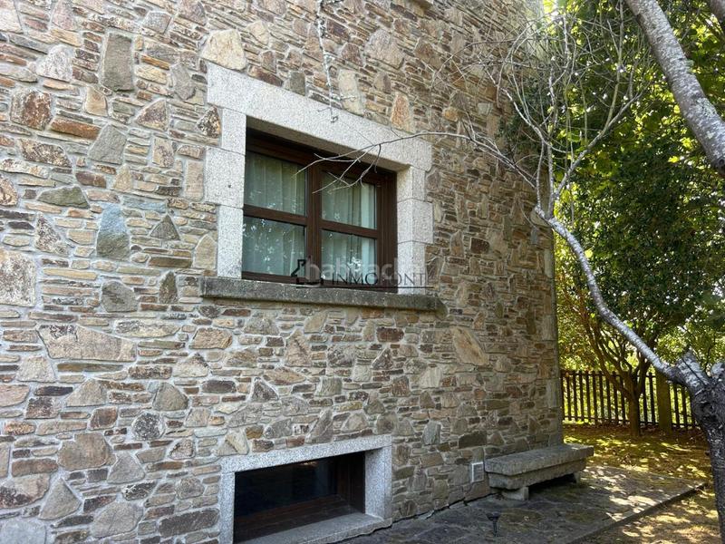 Foto 52fc4ce1-dc47-4739-8f8a-6adbd6dbd901. Casa chalet de piedra con viñedo, árboles frutales y vistas al mar sanxenxo en la exclusiva zona de casal, a tan solo tres minutos en en Meaño