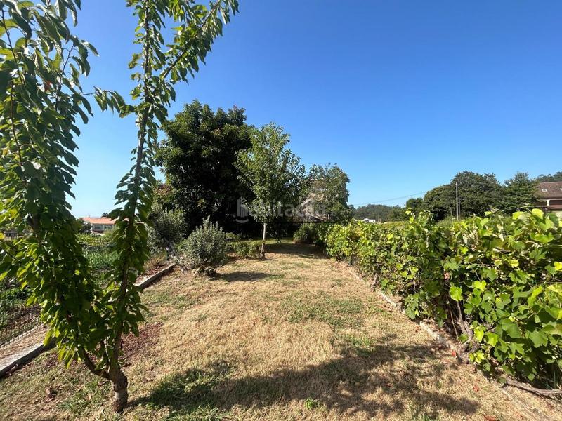 Foto 58df711d-3efa-457d-abbb-e35983d2eac9. Casa chalet de piedra con viñedo, árboles frutales y vistas al mar sanxenxo en la exclusiva zona de casal, a tan solo tres minutos en en Meaño