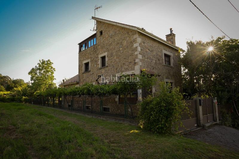 Foto b3936f25-7ad3-4cba-8435-97f96526411d. Casa chalet de piedra con viñedo, árboles frutales y vistas al mar sanxenxo en la exclusiva zona de casal, a tan solo tres minutos en en Meaño