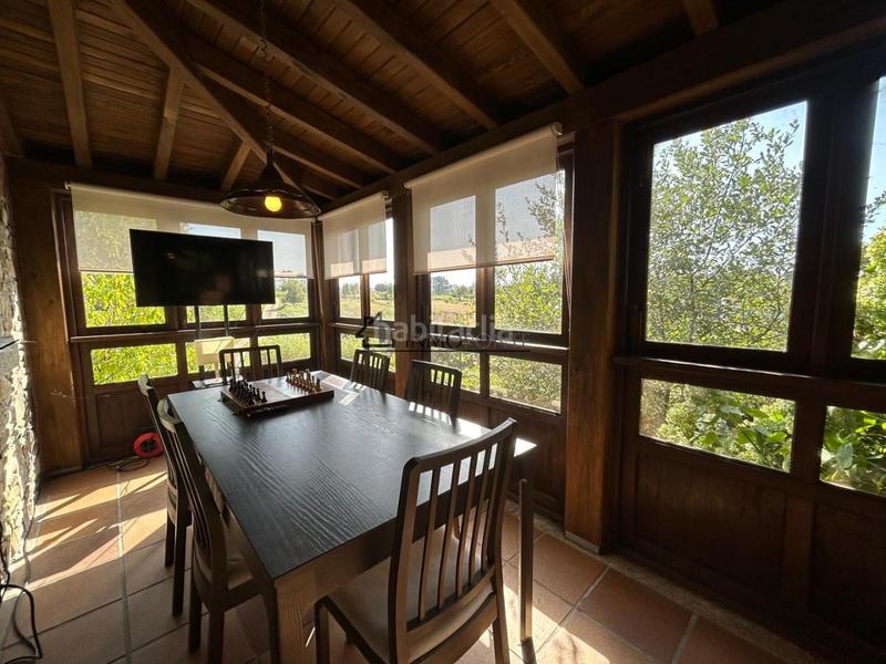 Foto c1e4c61d-1c10-4870-9355-5bf387a076e4. Casa chalet de piedra con viñedo, árboles frutales y vistas al mar sanxenxo en la exclusiva zona de casal, a tan solo tres minutos en en Meaño