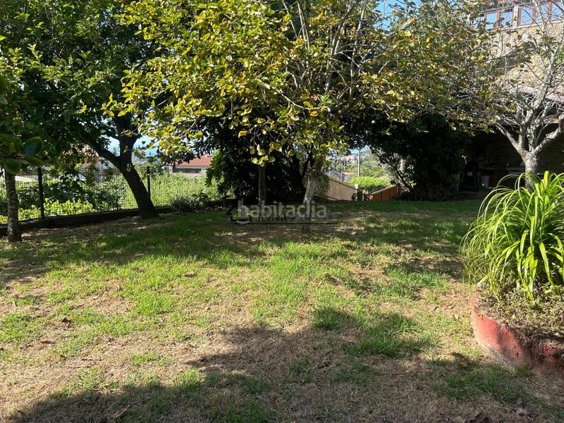Foto db9f004d-84ca-43ed-a580-22e430e2a621. Casa chalet de piedra con viñedo, árboles frutales y vistas al mar sanxenxo en la exclusiva zona de casal, a tan solo tres minutos en en Meaño
