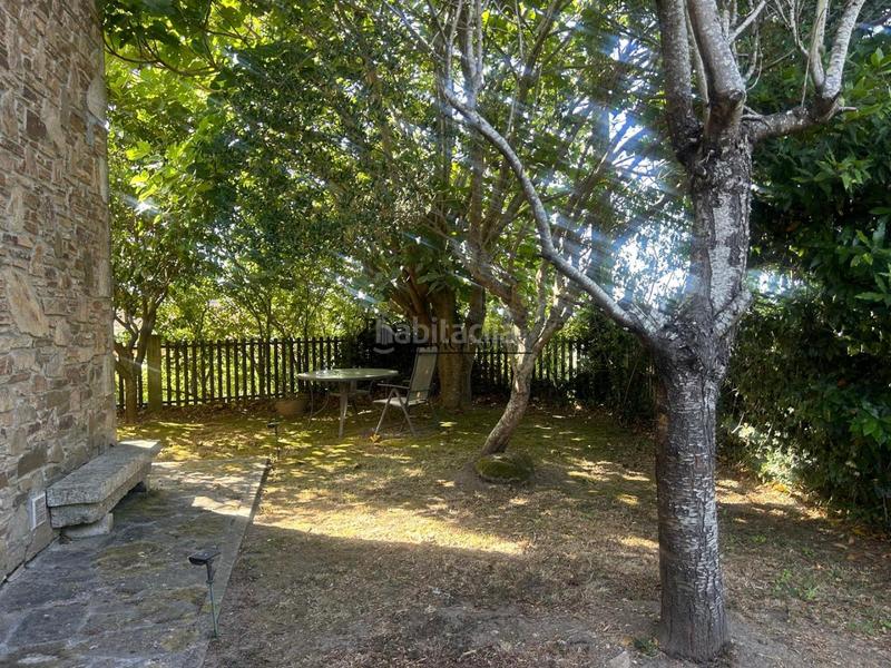 Foto f9d92aa9-0a6d-4d6b-92dc-e64749db3d4d. Casa chalet de piedra con viñedo, árboles frutales y vistas al mar sanxenxo en la exclusiva zona de casal, a tan solo tres minutos en en Meaño