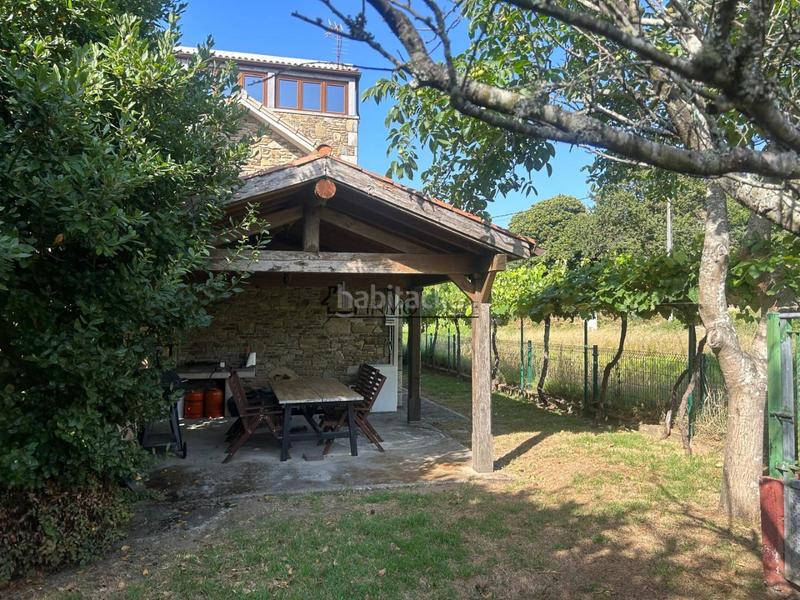 Foto fa6efe34-2eaf-49ee-a7bc-383a7c6e5ab7. Casa chalet de piedra con viñedo, árboles frutales y vistas al mar sanxenxo en la exclusiva zona de casal, a tan solo tres minutos en en Meaño