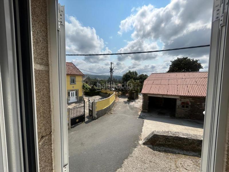 Foto e45bbc27-6204-4344-9da3-5e5ad0a9007f. Casa se vende casa en rabadeiras , con una finca de 500 m y un precioso hórreo de piedra situado justo enfrente de la vivienda, en Forcarei