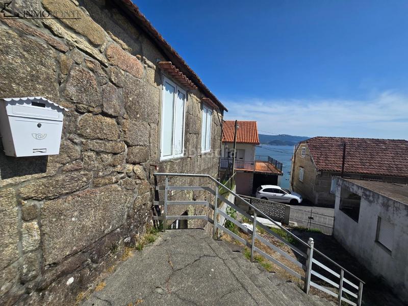 Foto 1c7af681-a7ac-4783-8e46-2f18b6a83c1a. Casa oportunidad única en raxó casa para restaurar con terreno y vistas al mar. buscas una propiedad con encanto, cerca del mar y con en Poio