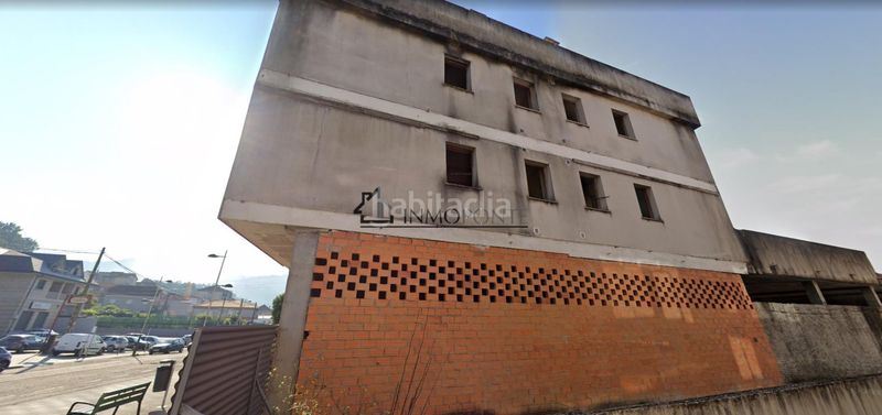 Foto 55a6cf19-bfd1-4879-b2d8-30cb7e60337a. Edifici a Porriño (O)