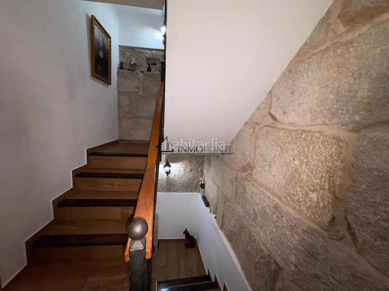 Foto 64a7555d-3f15-4b97-ad34-665a204a1988. Casa adossada a Marín