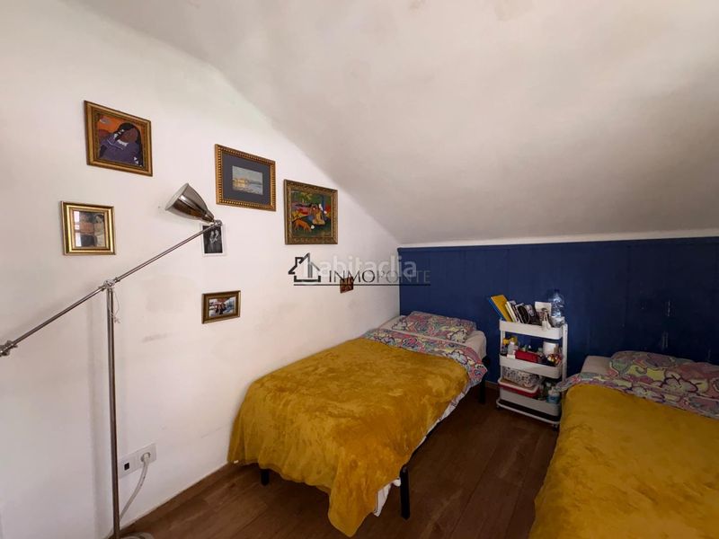 Foto 81cfc55f-ca16-4e63-a0d4-f2af14aa6e42. Casa adossada a Marín