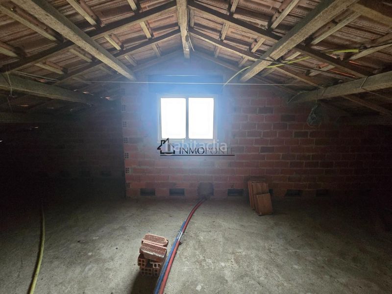Foto 4b99f7ca-ffd0-4985-8d7d-fca0ebc74a45. Casa amb calefacció aparcament a Moaña