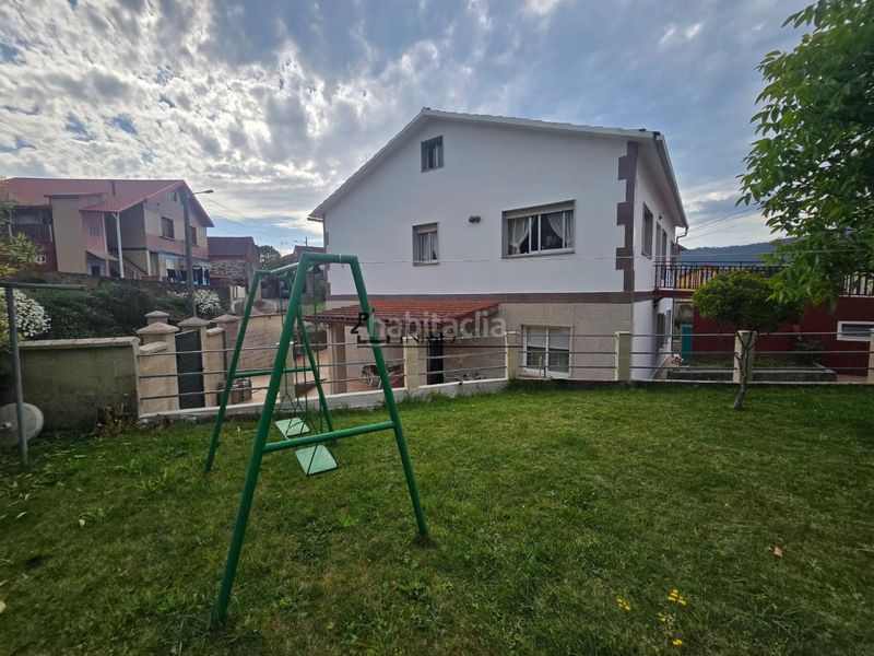 Foto d3ea2262-67ad-4142-aae9-be08a11ee718. Casa amb calefacció aparcament a Moaña