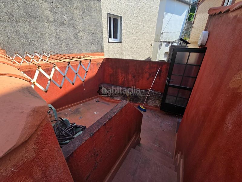 Foto d66b534d-ce9c-4019-a990-62759e0c46f3. Casa aparellada a Marín