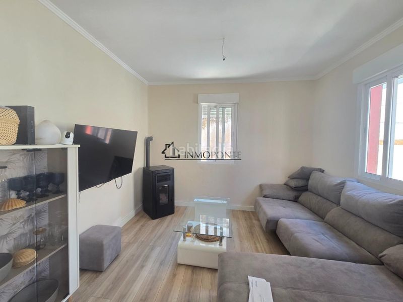 Foto d80d12af-1f7d-4012-b828-2e0efe13c37c. Casa amb calefacció a Marín