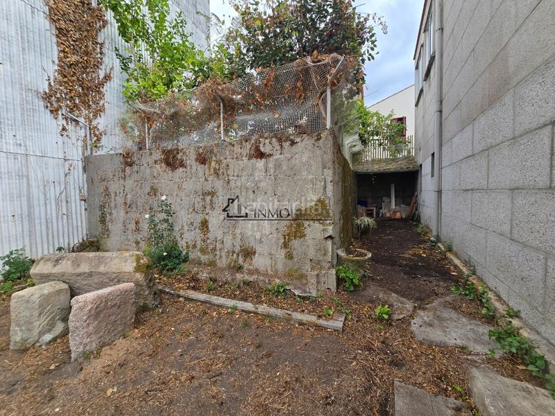 Foto 76c10e2c-8801-45f5-81dd-bf356b6bce3b. Casa amb calefacció aparcament a Centro - Echegaray Pontevedra