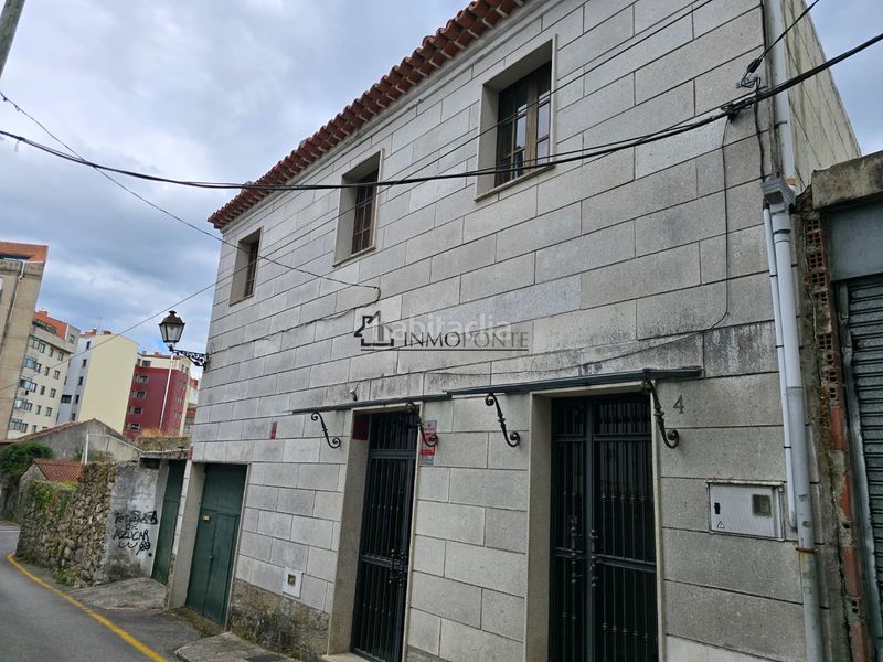 Foto bc0e9213-f9ff-41a1-b662-8b6d482abc1f. Casa amb calefacció aparcament a Centro - Echegaray Pontevedra