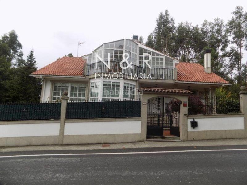 Foto 0434fe19-fc12-4f68-813b-918f9747c31f. Casa  con jardín en venta en O Milladoiro calle magdalane en Ames