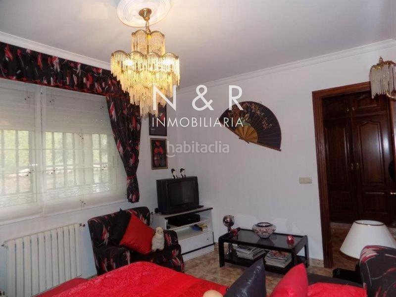 Foto 26dafb04-fc18-4220-923a-6a3fa4371c2f. Casa  con jardín en venta en O Milladoiro calle magdalane en Ames