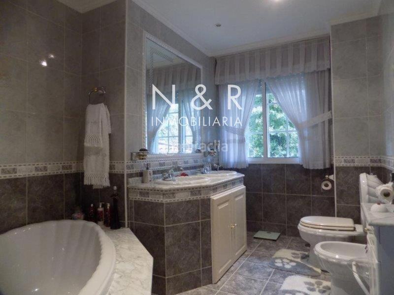 Foto 70b07693-d518-43e7-905d-c1aeb510600b. Casa  con jardín en venta en O Milladoiro calle magdalane en Ames