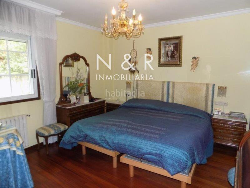 Foto b8ec13f0-d204-4032-b33b-888c2b158b24. Casa  con jardín en venta en O Milladoiro calle magdalane en Ames