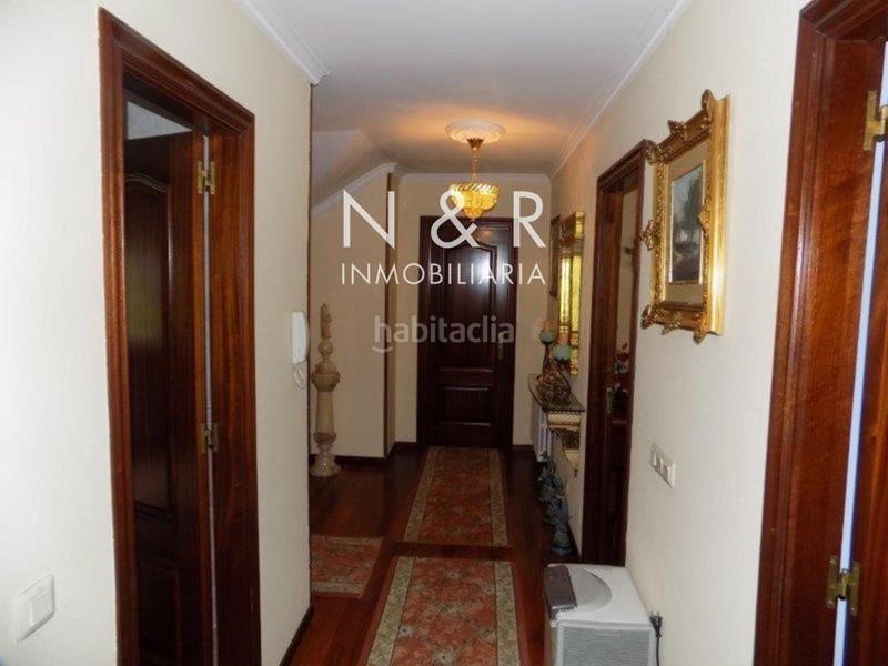 Foto d30d0da2-5f83-47ec-aef9-86ad0cb054c8. Casa  con jardín en venta en O Milladoiro calle magdalane en Ames