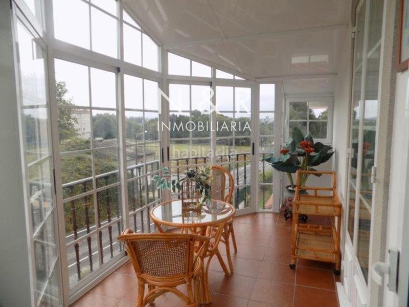 Foto fed9531d-6eb0-4310-ac2e-7c7e35b751c4. Casa  con jardín en venta en O Milladoiro calle magdalane en Ames