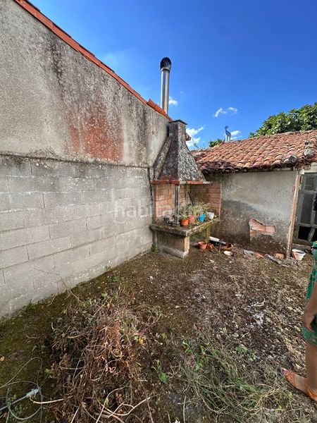 Foto a799ccad-1f75-4b26-805d-543cde4a560c. Casa adossada amb calefacció a Campus Norte - San Caetano Santiago de Compostela