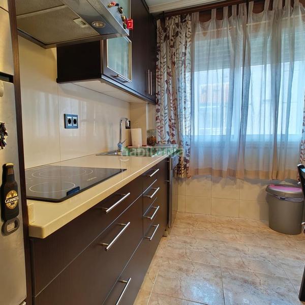 Foto d40ead1b-d88b-4ae6-9bd2-a527101260d6. Casa adossada amb calefacció aparcament a A Salgueira - O Castaño Vigo