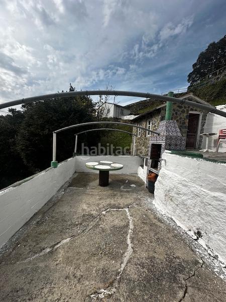 Foto f35fb045-c3ec-4c2b-bdb3-1fc993345879. Casa bifamiliare in calle cimadevilla 18 in Cudillero