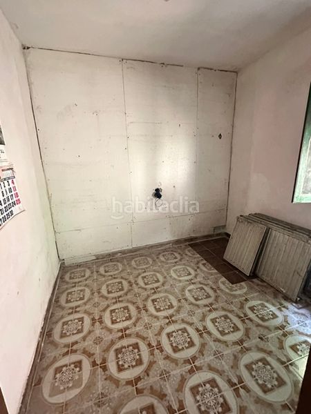 Foto 3cf147fc-3a15-47f8-ba33-07869e4086cc. Casa adosada en calle agustin bravo 27 en Pravia