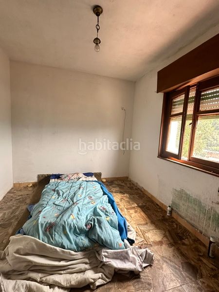 Foto 56e2fa7d-8e51-43aa-86c9-2beb5246c173. Casa adosada en calle agustin bravo 27 en Pravia