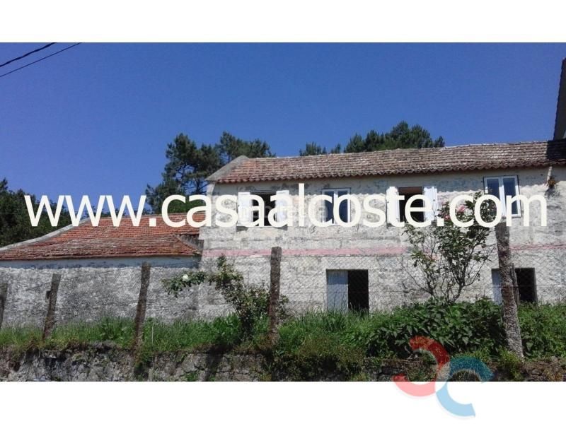 Foto 63e87997-f2db-4a33-8633-5f49d4ec8110. Casa amb aparcament a Marín