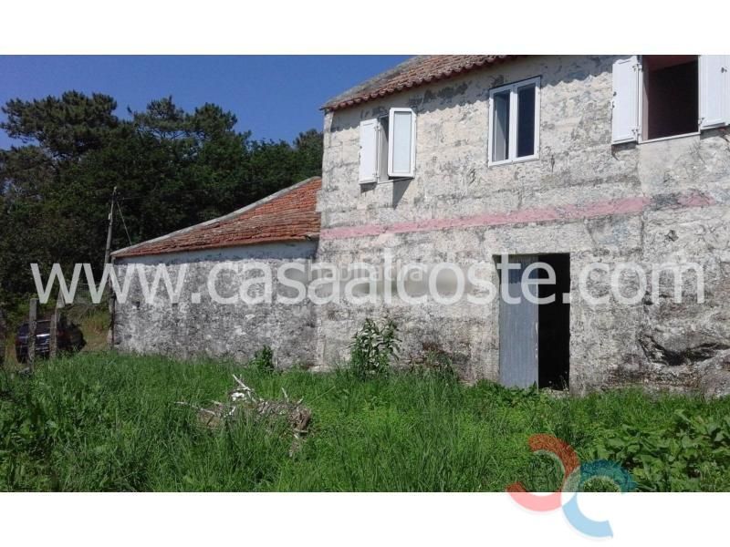 Foto c35419d1-aa91-4bda-b3e2-9bcb215458b5. Casa amb aparcament a Marín