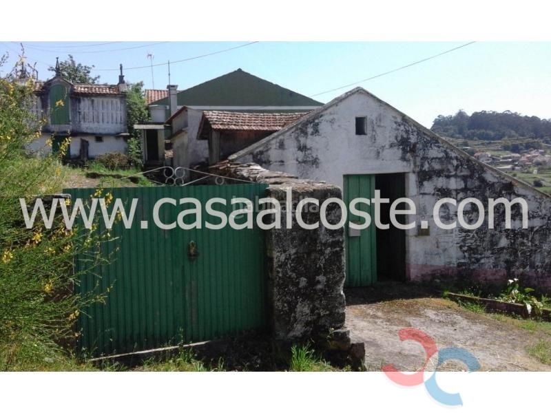 Foto fecd0a71-2908-4554-a7ef-0c284ab2f69a. Casa amb aparcament a Marín