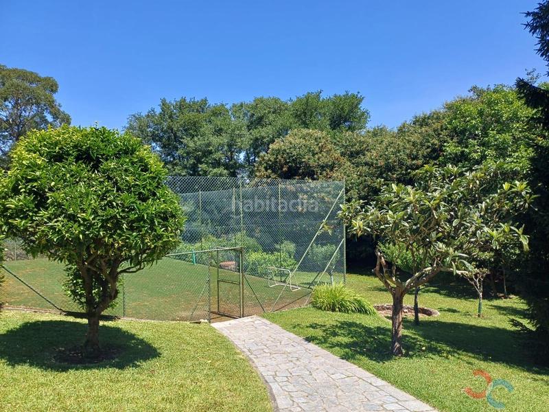 Foto b98600f8-8742-45f6-b83e-1a57287cf554. Chalet avec parking dans Fontecarmoa Vilagarcía de Arousa