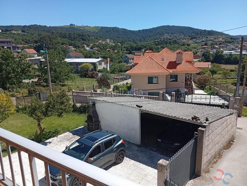 Foto 344e376c-1e2f-4ff5-9233-0c895093d499. Haus mit parking in Marín