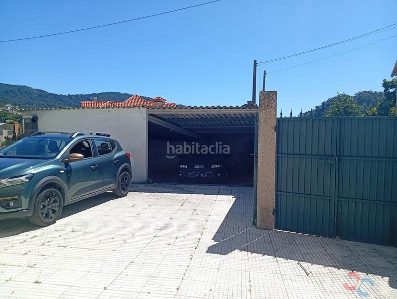 Foto eb79355e-0ffc-43d4-96f6-226a999f7595. Haus mit parking in Marín