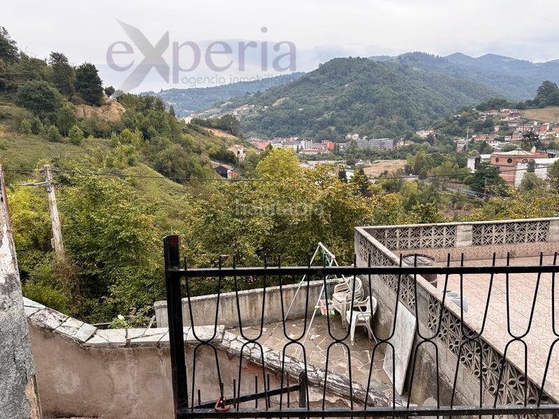 Foto 163812e8-c252-4f48-a820-83b7e5454e8b. Haus mit parking in San Martín del Rey Aurelio