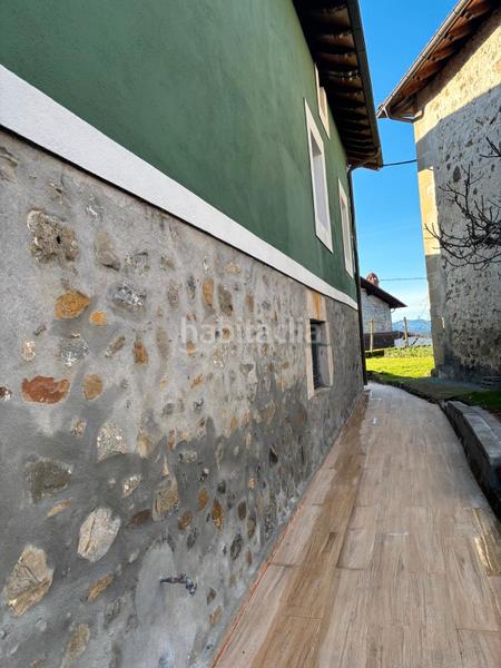 Foto 6e3b4d41-564a-4500-b680-0c1ec33a884b. Masia amb xemeneia calefacció a Orozko