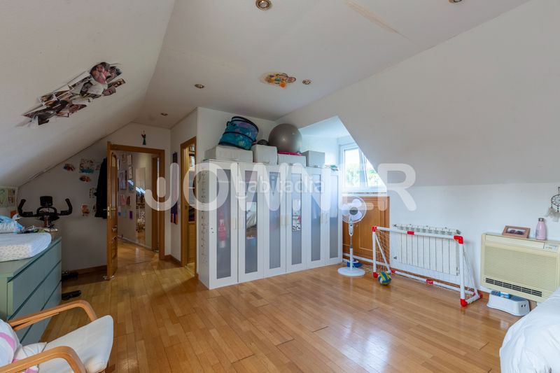 Foto a08cc459-8873-41de-921a-b4ac69c8bf16. Chalet with fireplace heating parking pool in Molino de la Hoz Rozas de Madrid (Las)