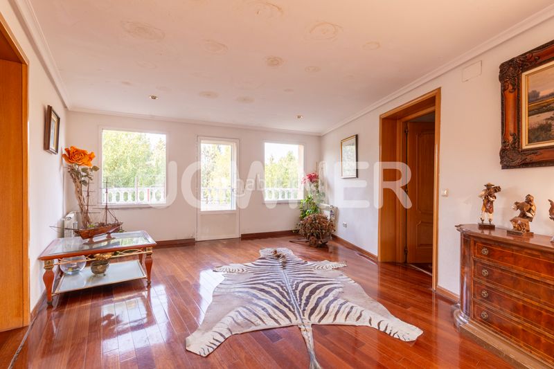 Foto b6cfef7b-6188-48ef-afe0-56e12b04d66c. Chalet with fireplace heating parking pool in Molino de la Hoz Rozas de Madrid (Las)