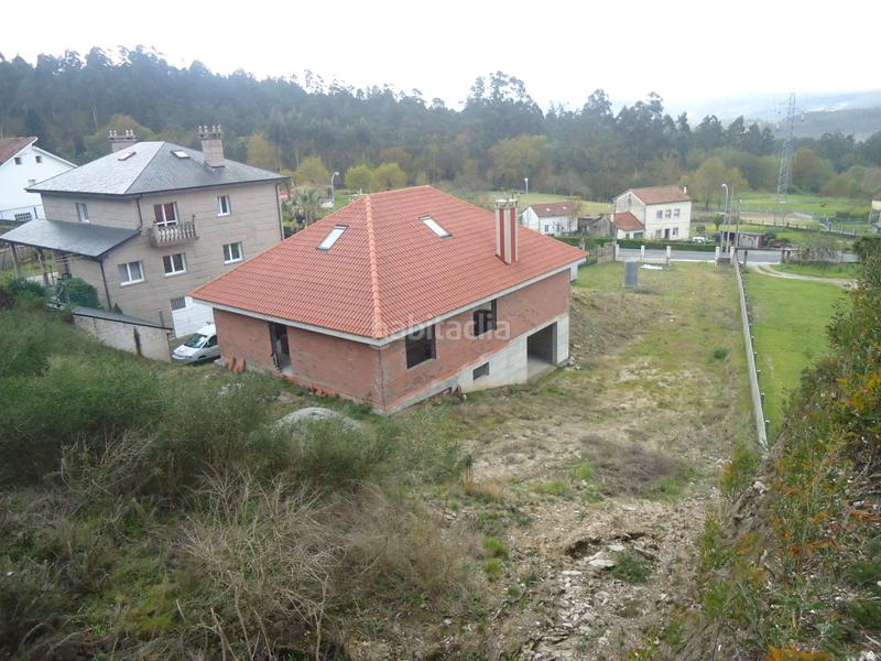 Foto c1f6ac8a-5315-4cc6-908a-63b98b63d421. Xalet amb aparcament a área de Ames Ames