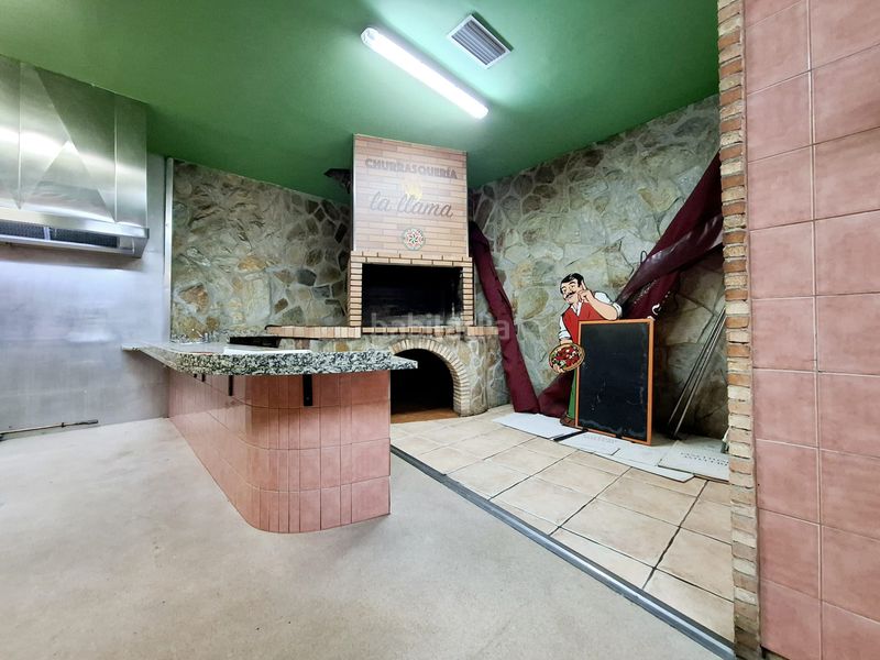 Foto c7ecda0c-0f7c-4ffb-9c88-1ef4c2e8f8e4. Local comercial amb calefacció a O Milladoiro Ames