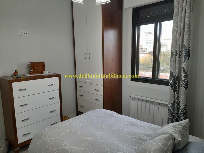 Foto b285cfc3-35fe-439c-8a13-69e4cacd9d8d. Casa amb calefacció a Tui