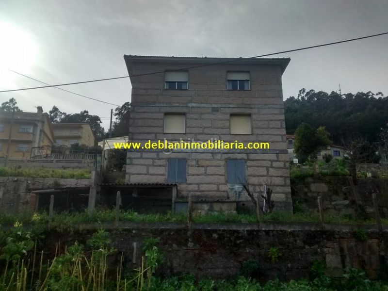 Foto f2e0b3aa-8b38-42ff-8b78-af17e80cc08c. Casa a Coiro Cangas