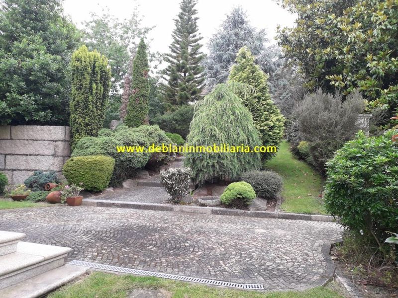 Foto 17786add-4c71-40aa-84e9-ae9e4a6e85e4. Xalet amb calefacció aparcament a Tui