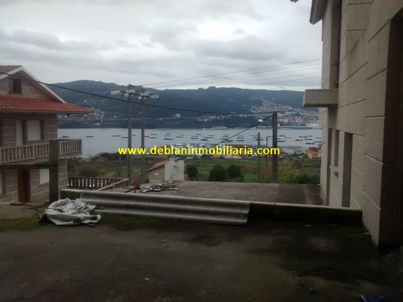 Foto 682e7252-6a4c-4fc3-a1f9-395fe7dc2ba7. Casa adosada en Moaña